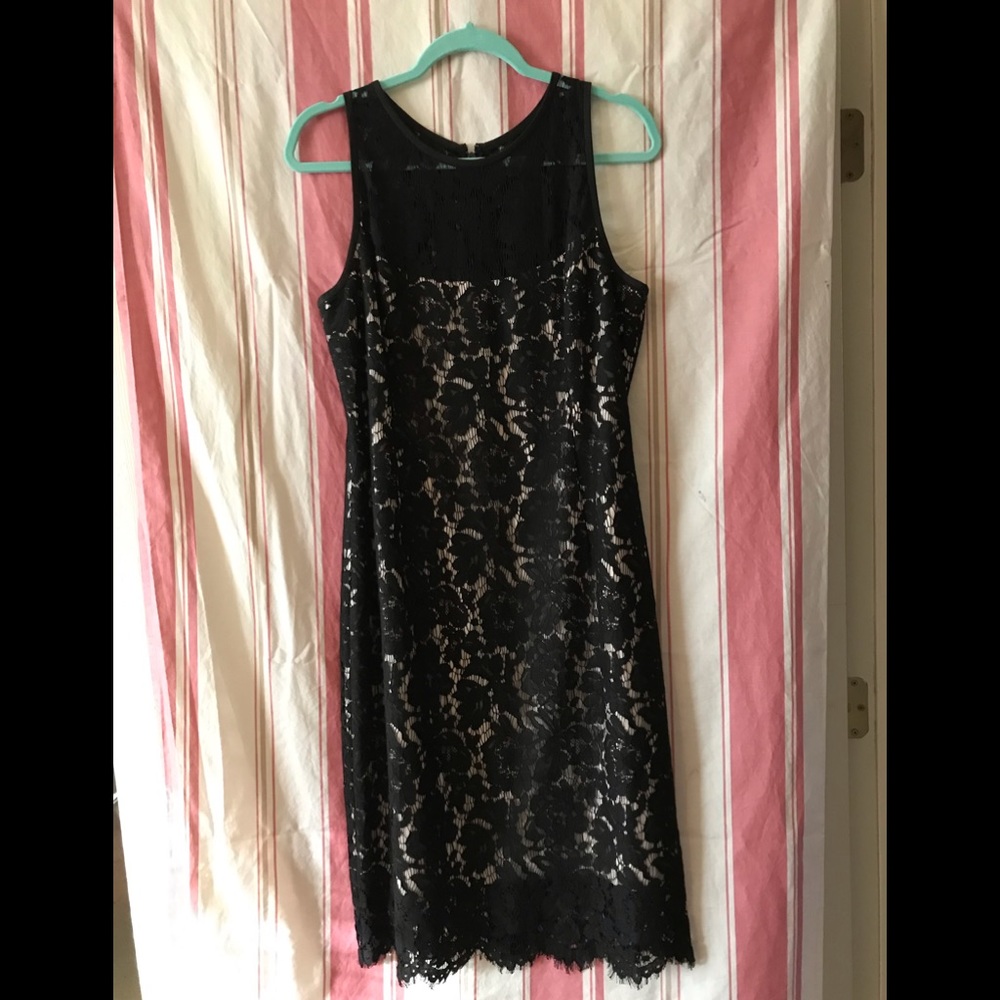 Black lace overlay. NWT.
